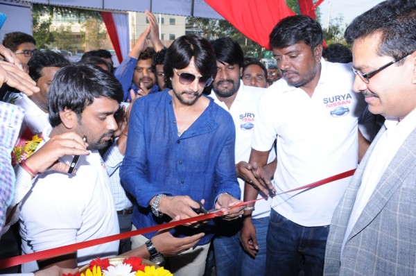 Actor Sudheep inaugurates  Surya Nissan as Dealer Principal K J. Suwresh looks on