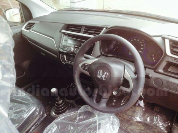 Honda Brio Facelift spotted at dealership dashboard