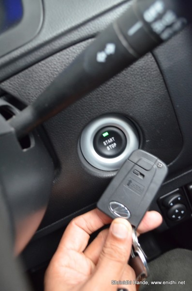 holding key fob next to start stop button